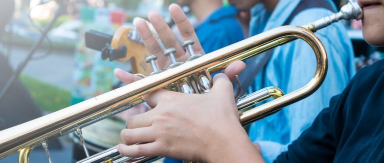 Decorative Image showing girl playing a trumpet